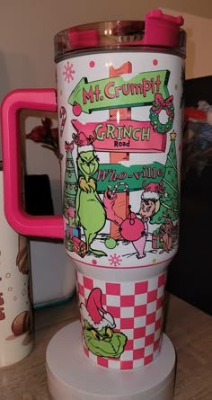 thermos cup is decorated with cartoon characters