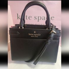 Authentic Kate Spade Brand New With Tags Kate Spade Staci Leather Small Satchel Crossbody Bag In Black.Comes Brand New With Tags Same Or Next Day Shipping Bag Details Color Is Black Saffiano Leather Zip Closure 1 Interior Slip Pocket, 1 Interior Zipper Pocket 2 Exterior Pockets Handles Are 4” Drop 9” (Width) X 7.5” (Height) X 4” (Depth) Long Crossbody Strap Included Price Is Firmprice Is Firmprice Is Firm Kate Spade Staci Small Satchel, Kate Spade Crossbody Satchel For Evening, Kate Spade Black Satchel For Evening, Kate Spade Black Satchel For Formal Occasions, Kate Spade Black Formal Satchel, Formal Black Kate Spade Satchel, Kate Spade Staci, Bags Kate Spade, Bag Details