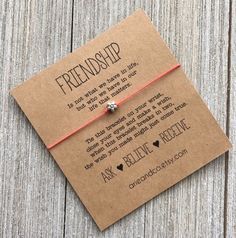 a card with a red string attached to it