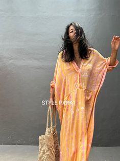 Jimbaran dress  is an oversized long sleeve soft rayon voile Long shirts  dress  .  This Oversized shirt dress is designed to flatter every body type and fit numerous occasions. 👍Included tali - f e a t u r e s - - Relaxed fit - Front pockets Fabric: 100% Soft rayon voile  Style:oversized fit Color:Bali Hand tie dyed peach & multi motif Wash :Hand cool wash  - measurement -  - One size  -  I recommend American size M to XL Chest /164cm/ 64inch(round) Length/135cm/53inch Transparent - it's  tran Spring Oversized Shirt Dress For Brunch, Flowy Long Sleeve Dresses For Beach Cover-up, Oversized Shirt Dress For Spring Brunch, Long Sleeve Shirt Dress For Spring Beach, Long Sleeve Shirt Dress For Summer Brunch, Long Shirt Dress For Beach In Fall, Summer Beach Maxi Shirt Dress, Fall Beach V-neck Shirt Dress, Long Casual Shirt Dress For Beach