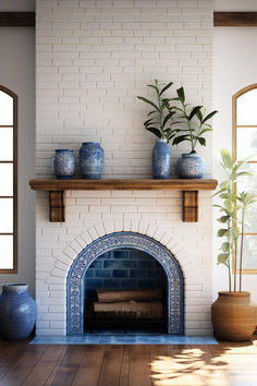 a white brick fireplace with blue vases on top