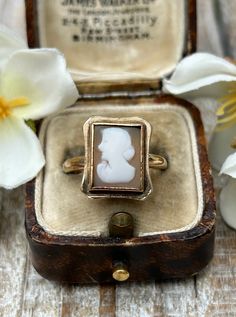 A lovely vintage cameo ring crafted in 9 carat solid yellow gold hallmarked in London in 1966.  This wonderful ring features a carved portrait of a lady set in a yellow gold bezel which provides a nice contrast and enhances the details of the carving.  The elegant rectangular shape of the cameo provides a timeless and sophisticated look leading to a sturdy plain polished shank.  It looks wonderful on the finger and has a nice solid heavy feel. In good vintage condition with light wear.  The came Vintage 14k Gold Cameo Rings, Antique Carved Rings For Anniversary, Vintage Carved Rings For Gifts, Antique Cameo Ring Collectible, Gold Cameo Signet Ring Collectible, Victorian Carved Ring For Anniversary, Vintage 14k Gold Carved Jewelry, Vintage Carved 14k Gold Jewelry, Classic Carved Signet Ring For Wedding