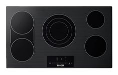 a black electric cooktop with four burners and knobs on the front side