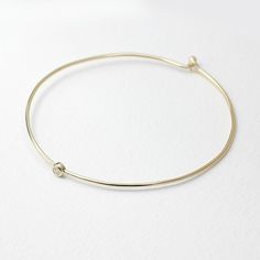 JSVConcepts Fine Jewelry Diamond Bangle Bracelet, Diamond Solitaire Bangle Bracelet, Minimalist Bracelet, 14K Gold Bangle Bracelet, Diamond Bracelet, Gift for her ≫ Product Details ◈ Handmade / Handcrafted Fine Jewelry ◈ Diamond: 100% Natural Diamond ◈ Diamond Weight: 0.07 ct. (2.60 mm) ◈ Color: G Color ◈ Clarity: VS-SI ◈ Cut: Brilliant Cut ◈ Bangle Thickness: 1.30 mm ◈ Metal: Solid 14K Gold (18K also available - Additional fees may apply) ◈ Gold Color: White gold, Rose gold, Yellow gold ≫ Pleas Modern 14k Gold Hoop Bracelets, Adjustable 14k Gold Bangle Bracelet, Minimalist 14k Gold Hoop Bangle, Modern Adjustable 14k Gold Bracelets, Classic Adjustable Hoop Bracelets, Elegant Adjustable Hoop Gold Bracelet, Adjustable Yellow Gold Hoop Bracelets, Adjustable Minimalist Yellow Gold Bracelets, Minimalist Adjustable Yellow Gold Bracelets