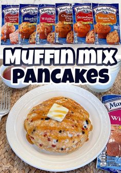 a stack of muffin mix pancakes on a white plate with butter and blueberries