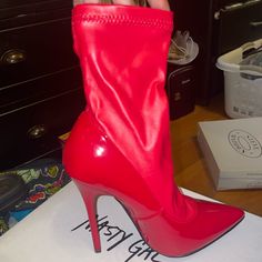 Brand New Never Worn Comes In Box Red Fitted Synthetic Boots, Red Synthetic Boots, Fitted Red Synthetic Boots, Red Ankle-high Heels For Night Out, Red Ankle-high Heels, Fitted Red Ankle Boots, Trendy Red Boots For Evening, Trendy Red Evening Boots, Red Ankle Boot Heels For Night Out