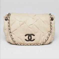 Authentic Chanel Ivory Quilted Iridescent Pleated Leather Crossbody Messenger Bag Condition Is Good, Some Normal Wear, Some Soiling Around, Moderate Wear On Strap. Always Authentic!!! Material: Calfskin Leather Color:Ivory Beige Includes: Chanel Dust Bag, Booklets, And Authenticity Card Origin: Italy Production Year: 2011 Date/Authenticity Code: 144xxxxx Measurements: 11" L X 2.5" W X 8" H Interior Pockets: One Zip Pocket Handles: Single Leather And Chain Entwined Strap Handle Drop: 20" Closure/ Chanel Mini Rectangular, Classic Flap Bag, Blue Wallet, Chanel Mini, Chanel Purse, Pink Chanel, Heart Bag, Leather Handbags Crossbody, Crossbody Messenger Bag