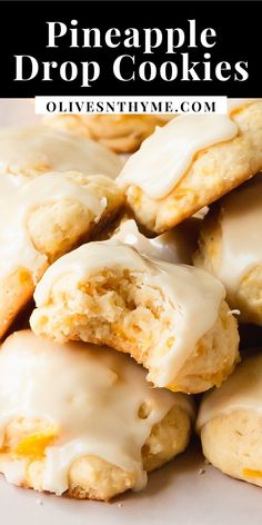 a pile of pineapple drop cookies sitting on top of a white plate