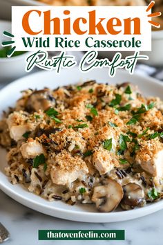 chicken wild rice casserole with mushrooms and parmesan crumbs in a white bowl