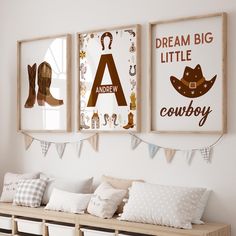 three framed pictures hang on the wall above a wooden bench with pillows and pillow cases