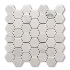 white marble hexagonal tile with an irregular pattern in the center, on a white background