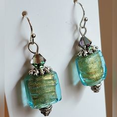 I Made These Earrings Using Vintage Handmade Glass Beads (Light Blue Or Aqua With Gold Glitter Swirls Inside), Antique Silvertone Findings And Swarovski Crystals. Beaded Jewelry Necklaces, Jewelry Making Earrings, Handmade Glass Beads, Making Earrings, Swarovski Crystal Earrings, Bead Stringing, Jewelry Inspo, Crystal Earrings, Gold Glitter