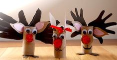 three toilet paper roll reindeers with red noses