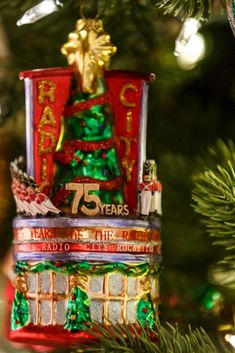 a christmas ornament hanging from a tree