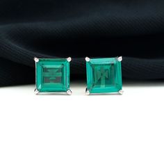 Product Details Show your Gratitude in a special and different style by gifting this Solitaire Stud Earrings. This Stud earrings feature with Princess Cut Created Emerald set as Solitaire in a Four Prong Setting. Product Information SKU SHP-EARRINGS062196323 Length 10 mm Width 10 mm Height 6.2 mm Weight 3.70 gm (Approximate) LAB CREATED EMERALD INFORMATION No.of Stones 2 Pieces Total Weight 10.00 Carat (Approximate) Dimension(approx) Princess Cut-10X10 mm-2 Pcs Color Green Cut Brilliant Shape Pr Emerald Earring, Emerald Set, Lab Created Emerald, Solitaire Studs, Emerald Earrings, Princess Cut, Prong Setting, Lab Grown, Different Styles