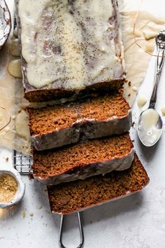 slices of carrot bread with icing on top