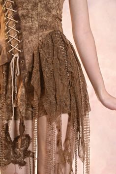 Elevate your Y2K Retro Vintage look with this Asymmetrical Lace-Up Strapless Bodice Top in Sand Brown. This top features a unique asymmetrical design and a lace-up front, adding an edgy, wasteland-inspired touch to your ensemble.  Garment Size   	 		 			Size 			S 			M 			L 		 		 			Bust 			76-78 			80-86 			84-90 		 		 			Waist 			62-66 			66-70 			70-74 		 		 			Full Length 			38/118 			40/118 			42/118 Bohemian Corset For Festivals, Summer Corset For Alternative Fashion, Bohemian Fitted Corset Dress, Spring Festival Corset Belt, Denim Bustier Top, Turquoise Skirt, Fall Grunge, Denim Bustier, Desert Dunes