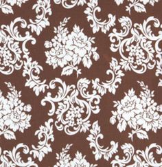 a brown and white floral pattern on fabric