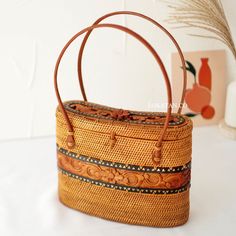 Daily Use Rectangular Satchel With Bamboo Handle, Vintage Rectangular Bag In Natural Color, Vintage Natural Rectangular Bag, Brown Basket Bag With Top Carry Handle, Daily Use Basket Shoulder Bag With Detachable Handle, Gift Bamboo Handle Handheld Shoulder Bag, Daily Use Basket Bag With Detachable Handle, Handheld Shoulder Bag With Bamboo Handle As Gift, Gift Handheld Shoulder Bag With Bamboo Handle