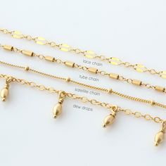 "Beautiful dainty chain anklets in 14K gold or sterling silver. Our delicate anklets are offered in four unique styles: dew drop, tube chain, lace chain or satellite chain. Pick one or more for a custom layering look just for you! *listing is for ONE delicate anklet in chain of your choice D E T A I L S * choice of chain: dew drops, tube chain, lace chain or satellite chain * 100% 14K gold fill or sterling silver chain and findings * spring clasp closure * Made in USAhandmade with love in San Di Adjustable Gold Anklets With Extender, Minimalist Gold Chain Anklets, Dainty Gold Anklet With Delicate Chain, Adjustable Gold Anklet With Lobster Clasp, Adjustable Gold Anklets With Satellite Chain, Adjustable Gold Anklet With Delicate Chain, Gold Anklet With Lobster Clasp, Gold Dangle Anklets As Gift, Gold Chain Anklets As Gift