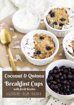 four bowls of breakfast cups with fresh berries and yogurt on the side next to a spoon