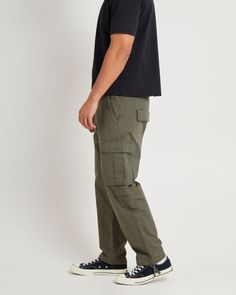 Military Style Relaxed Fit Cargo Pants With Flap Pockets, Combat Style Cargo Pants With Relaxed Fit, Combat Cargo Pants With Relaxed Fit And Cargo Pockets, Olive Military Cargo Pants With Patch Pockets, Olive Military Cargo Pants With Multiple Pockets, Military Style Cargo Pants With Hip Pockets, Green Military Style Straight Leg Cargo Pants, Urban Green Cargo Jeans With Patch Pockets, Urban Green Cargo Jeans With Hip Pockets