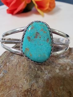 *27.4 Grams Turquoise Bracelet cuff *Free Shipping *components are solid .925 silver.  * Cuff 6  inches long end to end , opening gap is 1 1/4 inches adjustable  *Cuff 6" end to end . Opening 1"-1 1/4" Will fit wrist 7 to 7 1/2" perfect. Thank You For Your Looking ,And Check Out More Items In My Etsy Shop For More Great Deals, Also We Add More Jewelry To Etsy Shop Regularly  https://www.etsy.com/shop/ABQdesign. Please review items carefully before purchasing. I accept returns within 7 days of re Western Turquoise Bangle Cuff Bracelet, Western Style Turquoise Bangle Cuff Bracelet, Southwestern Turquoise Bangle, Turquoise Bracelet Cuff, Turquoise Cuff, Bracelet Cuff, Sterling Silver Cuff, Silver Cuff, Blue Turquoise