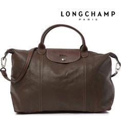 Longchamp Leather Top Handle Convertible Satchel Detachable Shoulder Strap - Top Zip Closure And Foldover Front Flap With Snap-Button Closure - Foldable Construction; You Can Fold In For A Compact And Easy To Store Or Fold Out For Extra Room - Embossed Leather Logo - Interior Features 1 Pen Pocket, 1 Slip Wall Pocket And 1 Zip Wall Pocket - Approx. 7" H X 10.5" W X 2" D (Folded) - Approx. 12" H X 20.5" W X 6.5" D (Unfolded) - Approx. 4" Handle Drop, 16" Strap Drop - Imported Leather Exterior, Te Longchamp Leather Bag, Longchamp Leather, University Bag, Longchamp Bags, Grey Tote, Red Tote, Brown Leather Totes, Brown Leather Bag, Mini Tote