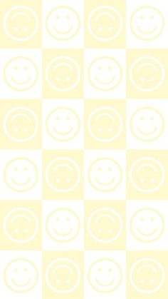 a pattern with smiley faces in white on a light green checkerboard background photo