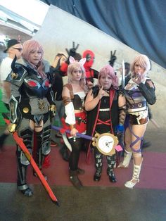 several cosplays are posing for a photo