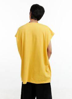 Product Detail Style : Street Occasion : Back to school Type : Men Print : Lettering Material : Cotton Sleeve : Sleeveless Neck : Round neck Fit : Oversize fit Cotton100 Color : Yellow, Black Made in Korea Model Size Model is wearing size M/L and the color Yellow. Height : 6'0" | 184cm / Top : L / Bottom : XL (32 inch) .prddescription table, .prddescription td, .prddescription th { border : 1px solid black; border-collapse : collapse; padding: 10px; } Size(Inch) Size Shoulder Bust Armhole Hem To Oversized Summer Tops For Leisure, Casual Tank Top With Relaxed Fit And Dropped Armholes, Casual Summer Muscle Tee With Dropped Armholes, Summer Casual Muscle Tee With Dropped Armholes, Casual Cotton Tank Top For Leisure, Urban Yellow Sports Tops, Relaxed Fit Sleeveless Top For Leisure, Casual Cotton Muscle Tee For Streetwear, Oversized Yellow Top For Streetwear