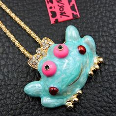 Betsey Johnson Girl Frog Pendant Necklace Item: Necklace Brand: Betsey Johnson Necklace Chain Length: 27" Inches + 2" Extender Pendant Dimensions: 1.57" x 1.18" (Inches) Color: Blue & Gold Metal: Alloy, Lead & Nickle Free Theme: Frog Fun pendants, flirty necklaces, and chunky bracelets do more than just add a touch of sparkle – they represent who you are. Betsey Johnson Jewelry does this beautifully with a complete line of pieces that are anything but traditional. With elements of sparkl Frog Pendant, Betsey Johnson Necklace, Chunky Bracelets, Necklace Chain Lengths, Necklace Brands, Betsey Johnson Jewelry, Betsy Johnson, Necklace Chain, Do More