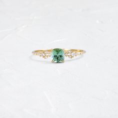 |14k Yellow Gold Melanie Casey, Small Pool, Negative Space, Green Tourmaline, Diamond Cluster, White Diamonds, The Gap, Round Cut Diamond, Cushion Cut