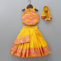 Yellow Multicolour Brocade Printed Top With Pleated Flap Lehenga And Net Dupatta Multicolor Fitted Sleeveless Sharara, Multicolor Sleeveless Bollywood Anarkali Set, Multicolor Sleeveless Choli With Dupatta, Traditional Yellow Sleeveless Anarkali Set, Traditional Yellow Sleeveless Sharara, Traditional Sleeveless Yellow Sharara, Yellow Sleeveless Choli With Pallu, Multicolor Sleeveless Lehenga For Navratri, Festive Sleeveless Bandhani Print Set