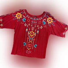 Southwestern Embroidery On A Wine/Burgundy Crinkle Quake Rayon Top, Short Sleeve. Never Worn. Pit To Pit:20” Shoulder Length: 25” Bohemian Tops With Geometric Embroidery, Red Boho Print Top For Festivals, Red Embroidered Festival Tops, Red Bohemian Tops For Festive Occasions, Red Bohemian Top For Festive Occasions, Red Tops With Floral Embroidery For Festivals, Bohemian Red Tops With Floral Embroidery, Red Bohemian Embroidered Top, Red Hippie Tops For Vacation