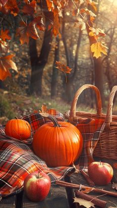 an autumn scene with pumpkins, apples and leaves