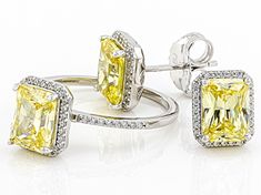 Bella Luce® canary and white diamond simulants 8.92ctw octagon and round, rhodium over sterling silver ring. Measures approximately 0.75" L x 0.38" W and is not sizable. Diamond equivalent weight is 5.40ctw. Yellow Emerald Cut Jewelry For Wedding, Octagon Yellow Gold Jewelry With Halo Setting, Octagon Jewelry With Halo Setting In Yellow Gold, Yellow Cushion Cut Jewelry With Prong Setting, Gia Certified Fine Yellow Jewelry, Gia Certified Yellow Fine Jewelry, Yellow Radiant Cut Jewelry For Anniversary, Yellow Radiant Cut Jewelry For Wedding, Radiant Cut Yellow Jewelry For Wedding