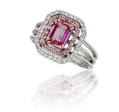 Stock Number: LR113161.15ct. Emerald cut pink sapphirePink sapphires in halo total weight... Pink Halo, Pink Engagement Ring, Pink Sapphire Ring Engagement, Pink Emerald, Double Halo, Halo Engagement Rings, Halo Diamond Ring, Blue Nile, Delicate Earrings