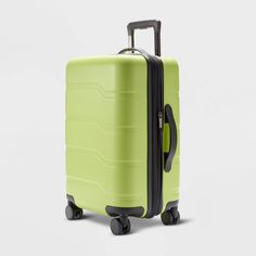 For convenient packing and traveling, pick this Hardside Carry-On Suitcase from Open Story™. Featuring a full zip-around closure, this lime green hardside suitcase is expandable to offer you extra space for additional stuff. The interior features multiple compartments and cross straps plus full lining. Designed with eight wheels, this hardside carry-on suitcase features a retractable handle for easy storage and holds up to 100 pounds. Open Story™: Every journey inspires a new chapter. Story Bags, Cute Suitcases, Men Faces, Spinner Suitcase, Metallic Purse, Girly Bags, Carry On Suitcase, Carry On Luggage, Large Backpack