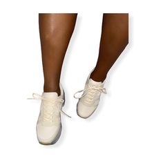 Note: Style runs true to size Model is a size 8 wearing a size 8 No half sizes Lace up platform Nude sneaker shoe Silver base bottom