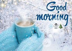 a cup of coffee is sitting in a blue mitt with the words good morning on it