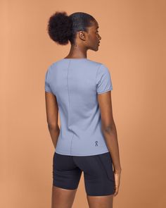 Featherlight fabric meets low-intensity fitness. This ultrasoft tee has all the performance and coverage you need to find your flow – and practice your forward fold poses. Welcome to the effortless style of the Movement-T. Soft, brushed fabric and distraction-free seams give you uninterrupted flow and freedom. Whether light workouts or busy days – it’s so comfortable, you'll forget it’s there. No more bunching, scrunching, or readjusting. Just peace of mind to focus on your workout. Understated Breathable 4-way Stretch Tops For Pilates, Casual Tops With Light Support For Pilates, Casual Tops With Light Support For Workout, Yoga Activewear With 4-way Stretch And Short Sleeves, Sporty Relaxed Fit Tops For Pilates, Casual Tops With 4-way Stretch For Pilates, Stretch Athleisure T-shirt For Pilates, Stretch Moisture-wicking T-shirt For Pilates, Moisture-wicking Sporty T-shirt For Pilates