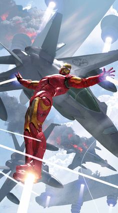 an iron man flying through the air next to fighter jets