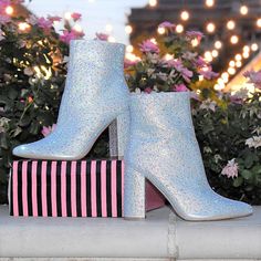 Crystal rhinestone cover booties featuring a 4" heel, completed with a zipper! Party Ankle Booties With 4-inch Heel, Glamorous High Heel Party Booties, Glamorous Ankle Heeled Boots For Night Out, Glamorous Fall Boots With 4-inch Heel, Glamorous 4-inch Heel Boots For Fall, Winter Party Boots With 4-inch Heel, Glamorous Party Booties With Round Toe, Party Booties With 4-inch Heel, Party Booties With 4-inch High Heel