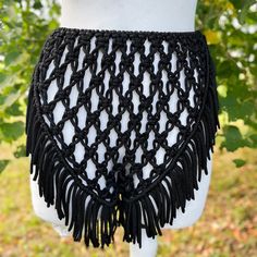 Macrame Festival Shorts - a perfect choice for Tomorrowland and beach party extravaganzas. This black boho-style shorts ensemble is your go-to for a fashionable birthday outfit, ensuring you stand out with style at every celebration. Information: * Material: polyester cord. * Color: black - ready to ship.  * Size: s-m. * Handmade by myself in Lithuania, Europe. * Size s-m in black is ready to ship. For other sizes or other colors - please contact me by messages here on Etsy.  Care recommendations: hand-wash only with soup, no tumble dry, lay the garment out to dry on the flat surface, like a sofa, table or countertop. Shipping: ready to ship item will be dispatched in 1-3 business days. Made to order items may take additional 3-7 business depending on cord availability and your request det Bohemian Shorts For Summer Beach Party, Bohemian Style Shorts For Beach Party, Bohemian Style Short Bottoms For Beach Party, Hippie Beach Shorts For Summer, Bohemian Shorts For Beach Party In Spring, Bohemian Style Shorts For Beach Party In Spring, Bohemian Bottoms For Summer Music Festival, Bohemian Bottoms For Music Festival, Bohemian Style Bottoms For Music Festival