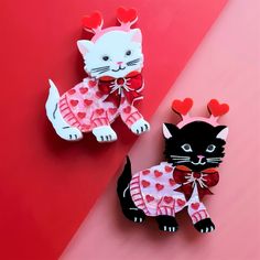 This little kitty is all dressed and ready to show how loved up she is for Valentines Day. She also represents love for family and friends and I feel that she can be worn all year round to add a touch of sweetness to our outfit. This brooch is made from 2 layers of gloss and hand mixed marble acrylics with hand inked engraved detail. She measures 7 cm in height and you can choose from black or white cat and as a brooch or necklace. The brooch is secured to a scroll back fastening and the necklac Cute White Brooch For Gift, Cute White Brooches For Gift, Cute White Brooches For Gifts, Marble Acrylics, Retro Speakers, Novelty Handbags, Vintage Inspired Christmas, Puzzle Crafts, Bone China Tea Set