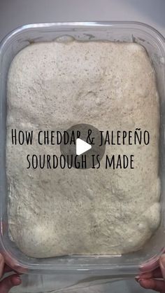 someone is holding up a container of sourdoughs with the words how cheddar & jalepeno sourdough is made