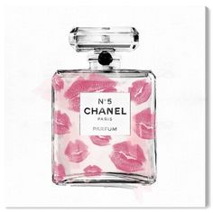 a bottle of chanel perfume with pink lipstick on it