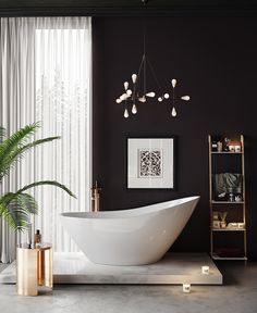 a bathroom with a large white bathtub next to a potted plant