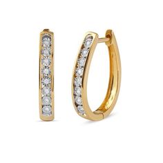 Level up your style with this stunning pair of diamond hoop earrings. Crafted in yellow gold plated sterling silver, these huggy hoops are lined with sparkling round cut diamonds, artfully set with miracle plates. Radiant with 1/10 ct.t.w. of diamonds and a brilliant buffed luster, these diamond huggies earrings are secured by hinged backs. Product Specification: Product Dimension : 20.20 mm (Length) x 3.60 mm (Width) x 15.70 mm (Depth) Earring Type : Huggie Hoop Earring Style : Single Row Diamo Huggies Hoop Earrings, Diamond Huggies, Hoop Earrings Style, Dimension 20, Gold Overlay, Diamond Hoop Earrings, Earring Type, Huggie Hoop Earrings, Yellow Diamond